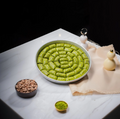 Koçak Famous Traditional Turkish Pistachio Rolls Baklava on a Tray