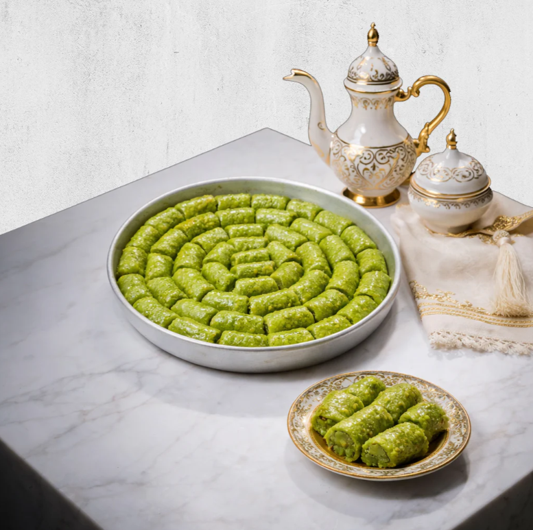 Koçak Famous Traditional Turkish Pistachio Rolls Baklava on a Tray