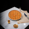 Koçak Famous Traditional Turkish Walnut Baklava on a Tray